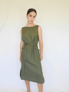 Khaki straight linen sleeveless mid calf length dress with front pockets, self tie belt, side splits, back opening