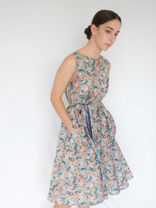 A-line knee length dress in blue Liberty cotton paisley print. with self tie belt and pockets