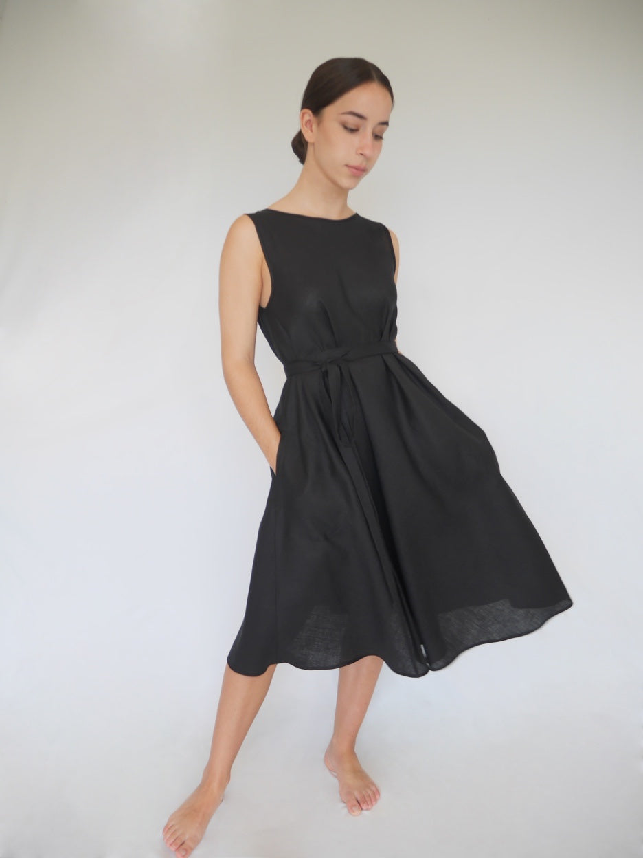 black linen a-line dress, sleeveless. v-shaped backneck