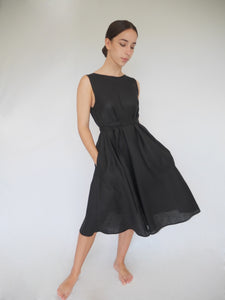 black linen a-line dress, sleeveless. v-shaped backneck