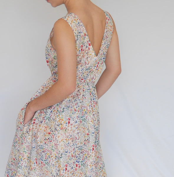 low cut back of whire floral A-line dress